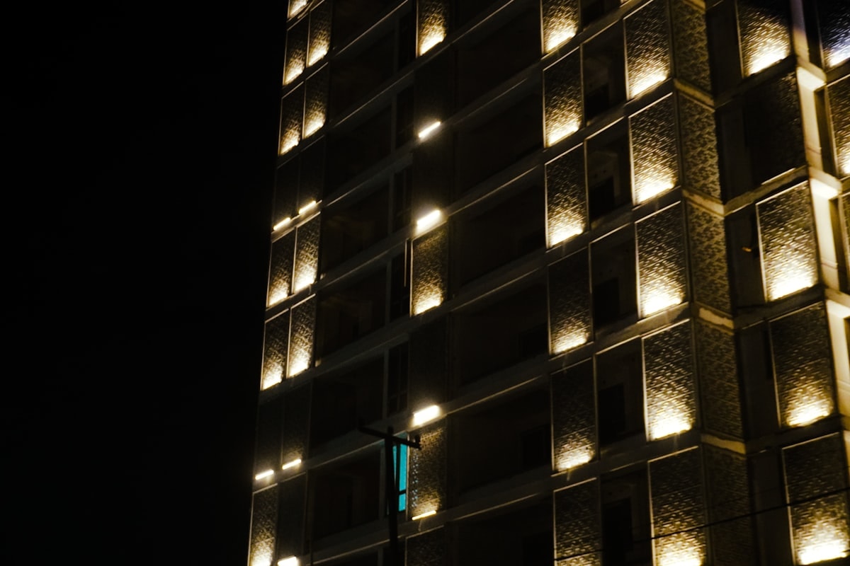 Gallery entrance with monumental concrete portal and bronze doors