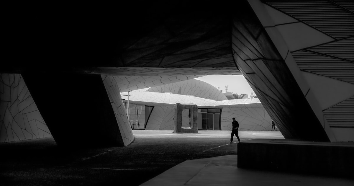 Shaded entrance colonnade with misting system and visitors