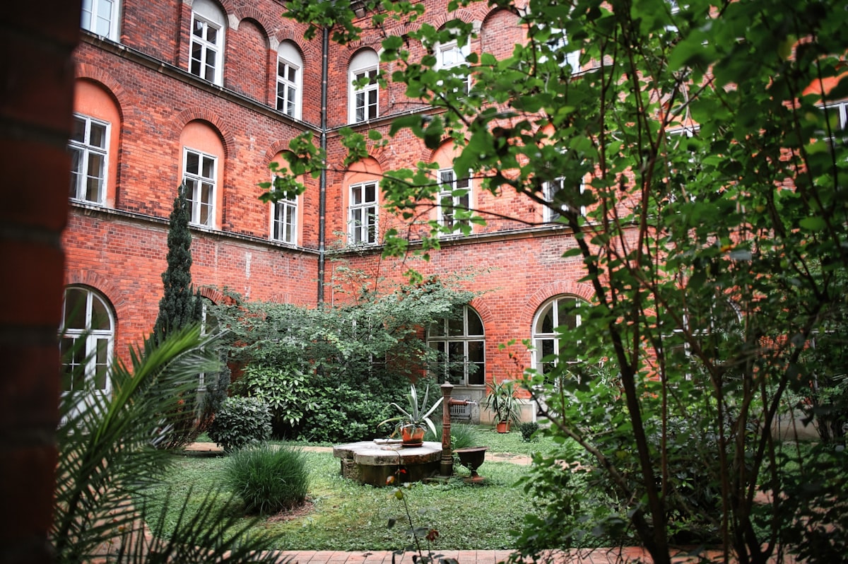 Native plantings and water channels in exterior landscape design