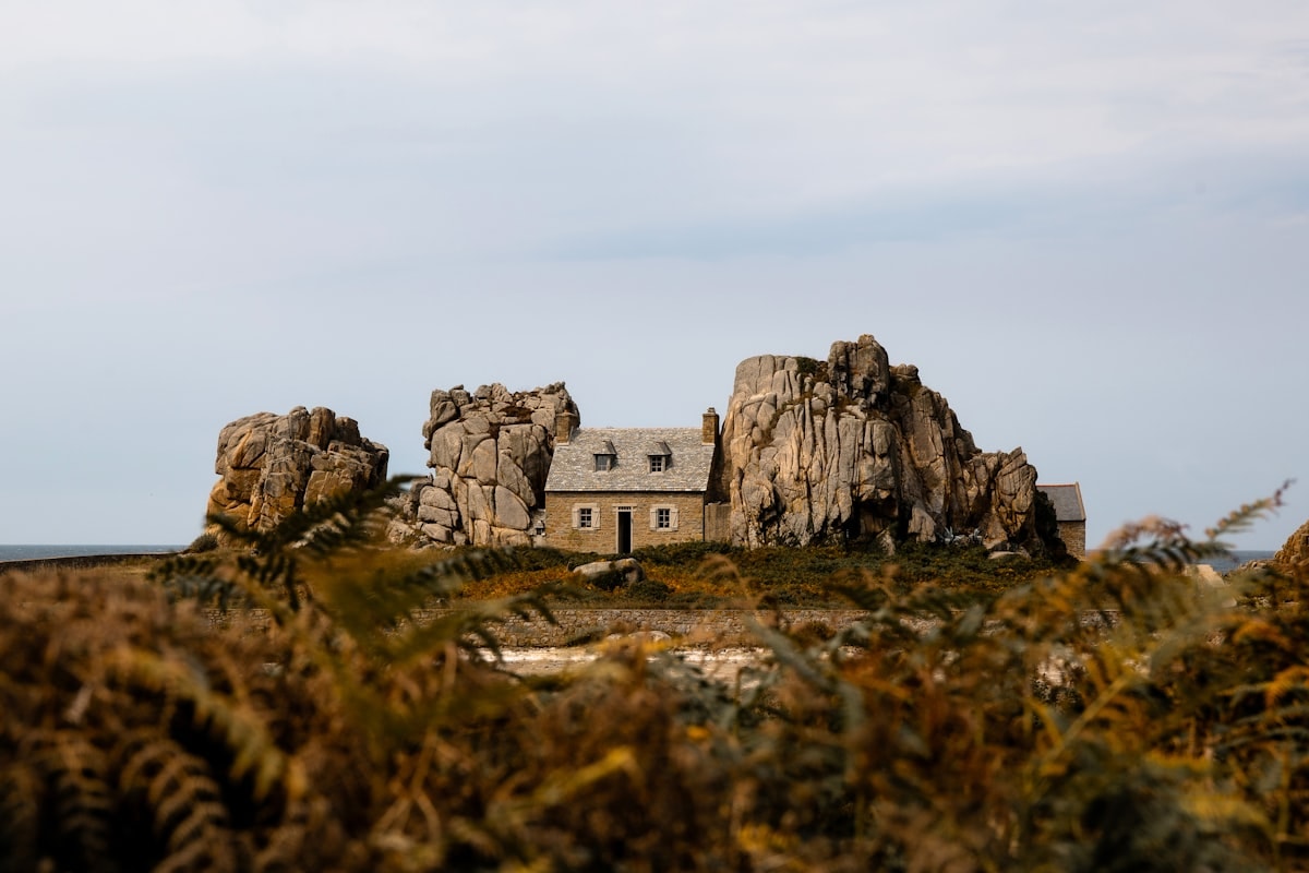 Close-up of local sandstone wall meeting polished concrete floor